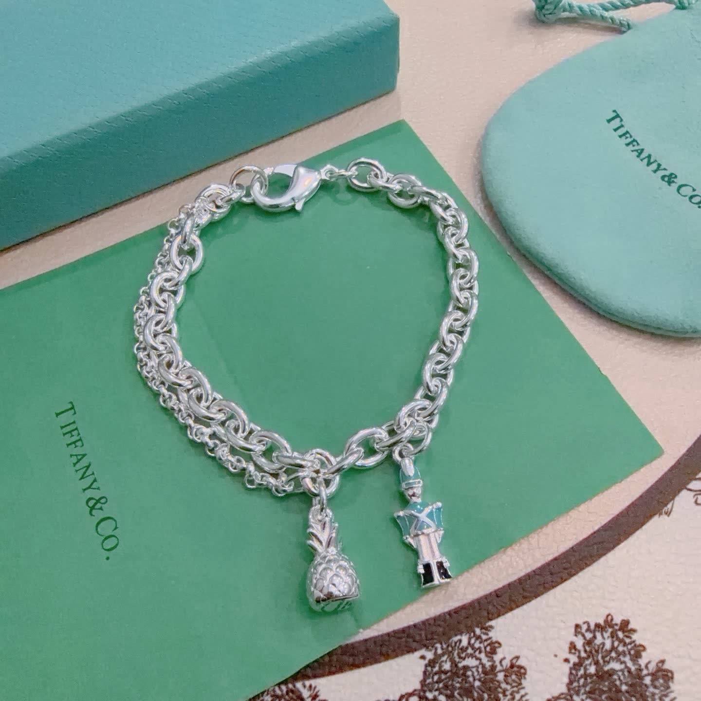 Tiffany & Co. Sterling Silver Link Bracelet with Charms